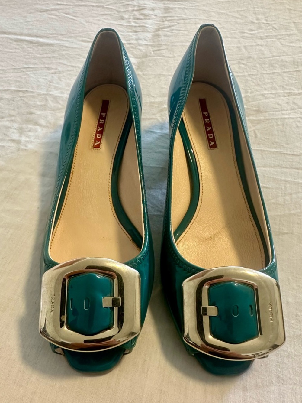 Authentic Prada Teal Patent Leather Buckle Pumps